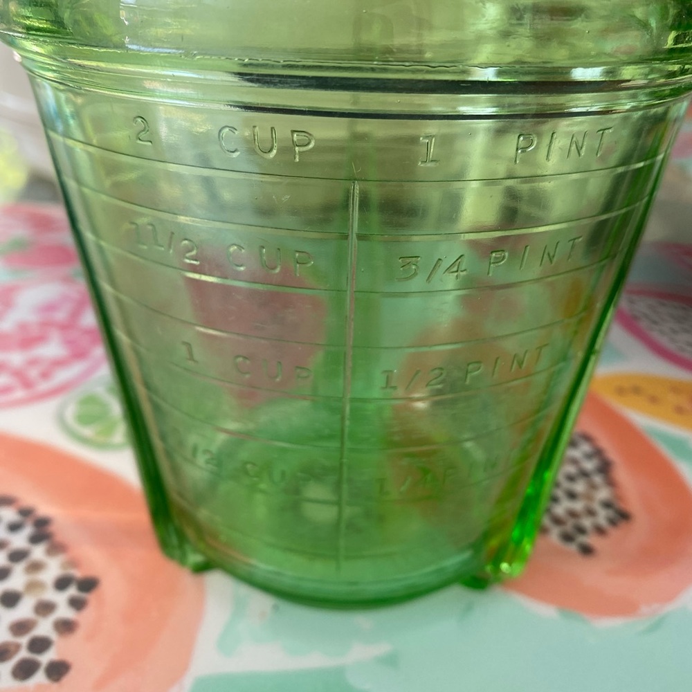Vintage green depression glass beater base jar